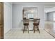 Dining area with bar, stools, and a view into the adjoining living space at 835 Pearleman Teague Rd, Siler City, NC 27344