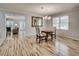 Inviting dining room with wood flooring, offering a seamless transition to adjacent living area at 835 Pearleman Teague Rd, Siler City, NC 27344