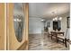 View of dining room with wood floors and open access to kitchen area at 835 Pearleman Teague Rd, Siler City, NC 27344