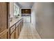 Laundry room with cabinets, granite countertops, and a window at 835 Pearleman Teague Rd, Siler City, NC 27344