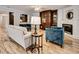 Inviting living room featuring a fireplace, custom cabinets, and hardwood floors at 835 Pearleman Teague Rd, Siler City, NC 27344