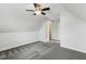 Bedroom featuring a ceiling fan, neutral paint, patterned carpet, and an adjoining bathroom at 853 Bluffcreek Dr, Fuquay Varina, NC 27526