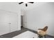 This bedroom features a fan, neutral walls and flooring and white trim and doors at 853 Bluffcreek Dr, Fuquay Varina, NC 27526