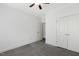 Bright bedroom features neutral walls, fan, carpet and white trim and doors at 853 Bluffcreek Dr, Fuquay Varina, NC 27526