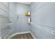 Walk-in closet featuring white wire shelving at 853 Bluffcreek Dr, Fuquay Varina, NC 27526