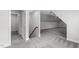 Upstairs hallway featuring neutral walls and flooring and access to multiple rooms at 853 Bluffcreek Dr, Fuquay Varina, NC 27526