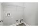 Laundry room featuring tile flooring, a utility sink, and washer/dryer hookups at 853 Bluffcreek Dr, Fuquay Varina, NC 27526