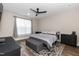 Neutral bedroom featuring dark furniture and wood floors at 9 Moss Side Ter, Durham, NC 27703