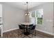 Breakfast nook features a round table with four chairs and a window at 9 Moss Side Ter, Durham, NC 27703