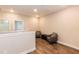 Loft with two chairs and an entry to the bathroom at 9 Moss Side Ter, Durham, NC 27703