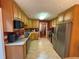 Spacious kitchen featuring stainless steel appliances and abundant cabinet storage at 100 Deer Ridge Rd, Siler City, NC 27344