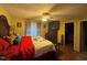 Comfortable main bedroom featuring a ceiling fan and closet at 100 Deer Ridge Rd, Siler City, NC 27344