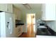 Well-lit kitchen featuring ample counter space and modern appliances at 106 Knight Ct, Graham, NC 27253
