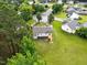 Home aerial showcasing backyard and surrounding neighborhood at 107 Winter Ct, Selma, NC 27576