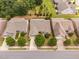 Aerial view showcasing the home's roof, surrounding community and landscaped yards at 1104 Gaston Manor Dr, Durham, NC 27703