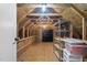 Unfinished attic storage area with visible wood framing and rafters, offering ample storage potential at 1104 Gaston Manor Dr, Durham, NC 27703