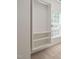 Walk-in closet featuring custom shelving, and a window providing natural light at 1104 Gaston Manor Dr, Durham, NC 27703