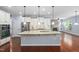 Island kitchen boasting granite countertops and stainless steel appliances at 1104 Gaston Manor Dr, Durham, NC 27703