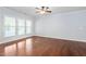 Open living room with hardwood floors and natural light at 1104 Gaston Manor Dr, Durham, NC 27703
