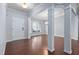 Open living area with hardwood floors and plenty of natural light at 1104 Gaston Manor Dr, Durham, NC 27703
