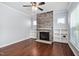 Living room with hardwood floors and a stone fireplace at 1104 Gaston Manor Dr, Durham, NC 27703