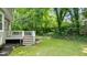 Backyard featuring a wooden deck and yard space at 113 Fox Run, Henderson, NC 27536