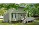Exterior view of home's deck, backyard, and siding at 113 Fox Run, Henderson, NC 27536