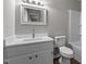 Bathroom with updated vanity and lighting at 113 Fox Run, Henderson, NC 27536
