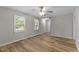 Bright living room featuring durable floors, fresh paint, and ample natural light at 113 Fox Run, Henderson, NC 27536