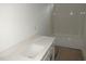 Bathroom with a sleek sink and modern tub ready for new finishing touches at 1155 Shonele Ln, Stem, NC 27581