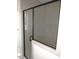 Modern bathroom features a glass shower with black trim and tile surround at 1155 Shonele Ln, Stem, NC 27581