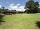 Expansive backyard featuring a lush green lawn perfect for outdoor activities and relaxation at 12082 Nc 42, Fuquay Varina, NC 27526