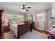 Comfortable bedroom with hardwood floors, natural light, and elegant decor at 12082 Nc 42, Fuquay Varina, NC 27526