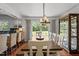 Bright dining room features a wooden table, seating for six and natural light at 12082 Nc 42, Fuquay Varina, NC 27526