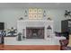 Charming fireplace with mantle decor and bright, airy atmosphere at 12082 Nc 42, Fuquay Varina, NC 27526