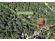 An aerial view showing the home's proximity to the Kildaire Farm Greenway, perfect for outdoor activities at 128 Castlewood Dr, Cary, NC 27511