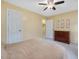 Bedroom features neutral walls, carpet flooring, and a bed at 128 Castlewood Dr, Cary, NC 27511