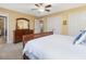 Spacious main bedroom with carpet floors, a large dresser, and access to a full ensuite bathroom at 128 Castlewood Dr, Cary, NC 27511