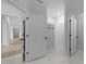 Bright bathroom showcasing a tiled shower, open doorway, and neutral color scheme at 1319 Richfield Oaks Dr, Fuquay Varina, NC 27526