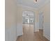 Spacious foyer with hardwood flooring and views into the home's living areas at 1319 Richfield Oaks Dr, Fuquay Varina, NC 27526