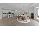 Bright, open-concept living area with a modern kitchen and dining space at 1319 Richfield Oaks Dr, Fuquay Varina, NC 27526