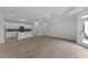Spacious living area with hardwood floors and natural light from patio door at 1319 Richfield Oaks Dr, Fuquay Varina, NC 27526