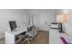 Spacious home office with modern furnishings, wood floors, and natural light, perfect for working from home at 1319 Richfield Oaks Dr, Fuquay Varina, NC 27526