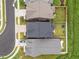 Aerial view showcases the layout of the property, including the backyard, roof lines, and proximity to neighbors at 140 Big Barn Dr, Wendell, NC 27591