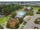 Charming community featuring a large pool, clubhouse, playground, and well-maintained green spaces at 140 Big Barn Dr, Wendell, NC 27591