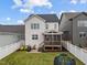 The backyard features a screened porch, a fenced-in yard, and a patio perfect for grilling and outdoor seating at 140 Big Barn Dr, Wendell, NC 27591