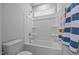 Clean and modern bathroom featuring a bathtub with integrated shelves at 140 Big Barn Dr, Wendell, NC 27591