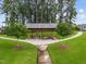 Beautiful neighborhood park pavilion offers picnic tables and seating surrounded by mature trees and walking paths at 140 Big Barn Dr, Wendell, NC 27591