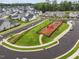 Aerial view of the neighborhood playground with play structures and green space, showcasing the community amenities at 140 Big Barn Dr, Wendell, NC 27591