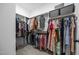 Organized walk-in closet with ample storage and hanging space for clothing at 140 Big Barn Dr, Wendell, NC 27591